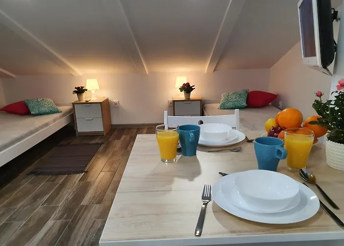 Na Poddaszu Czwarte Pietro Habitación en casa particular *