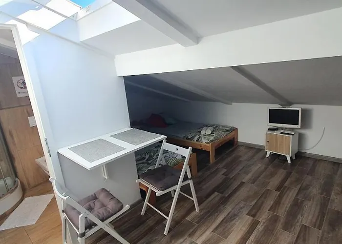 Na Poddaszu Czwarte Pietro Habitación en casa particular *